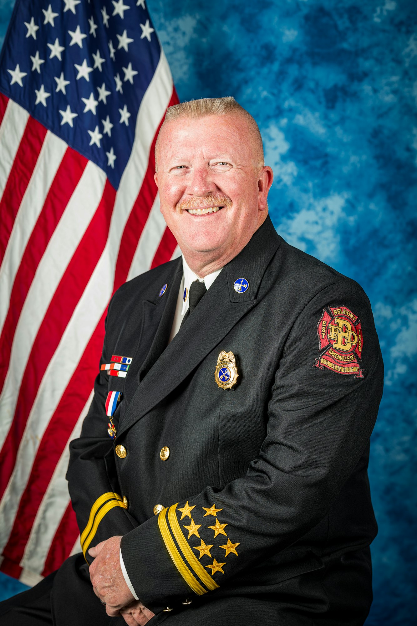 Captain Steve Quinn with US Flag Back Drop