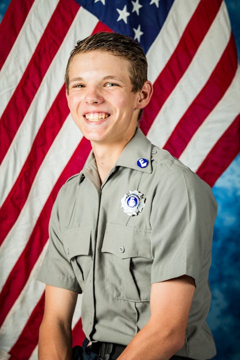 JR FF Dawson Ashmore 2024 Photo with US Flag