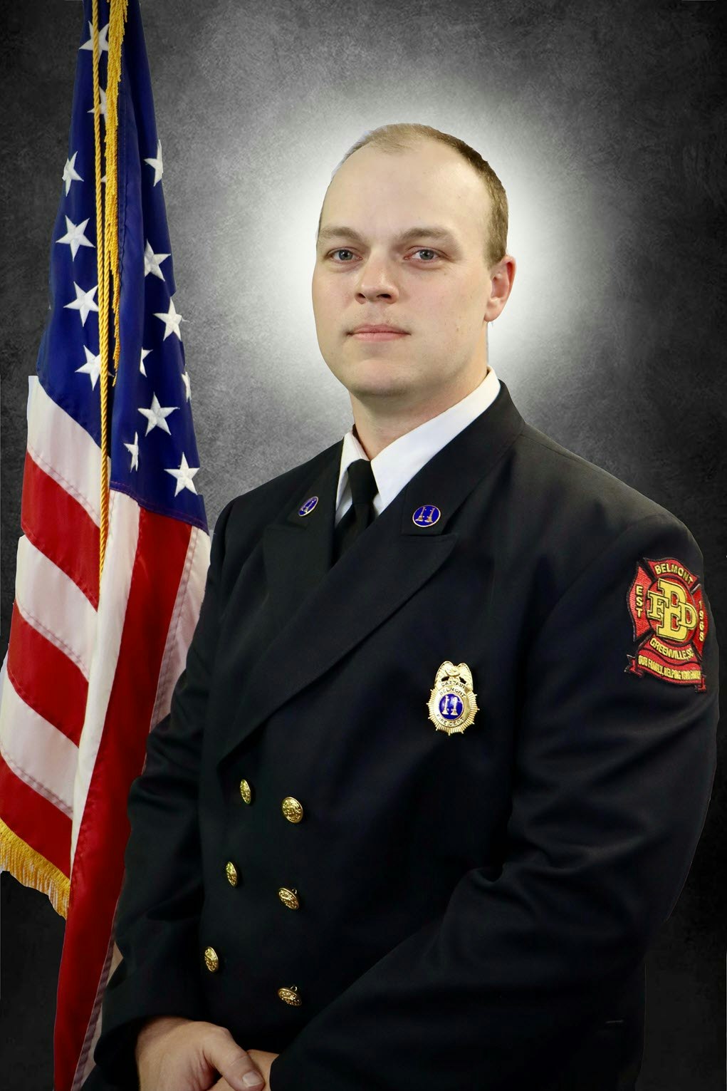 Master FF/EMT Dillon Myers Photo in front of US Flag