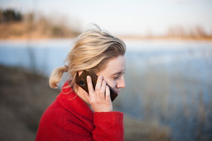 May contain: photography, head, person, face, blonde, hair, electronics, mobile phone, and phone