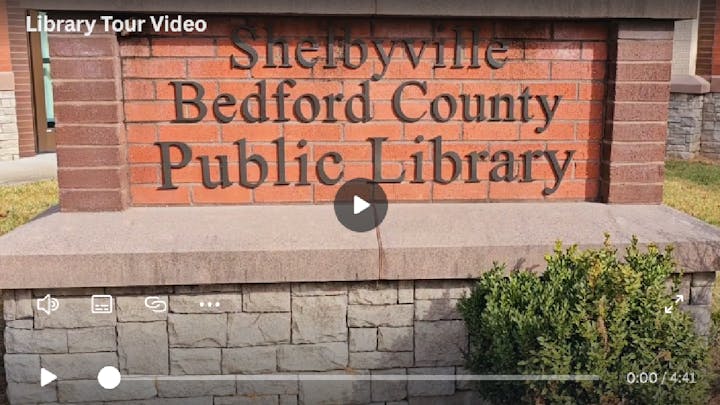 A screenshot of a library tour video featuring the Shelbyville Bedford County Public Library sign.