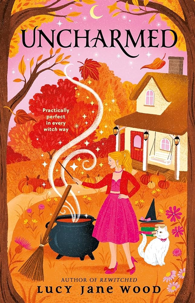 A witch in pink stirs a boiling cauldron. A white cat with a witch hat sits nearby. Orange autumn scenery surrounds a cozy house.