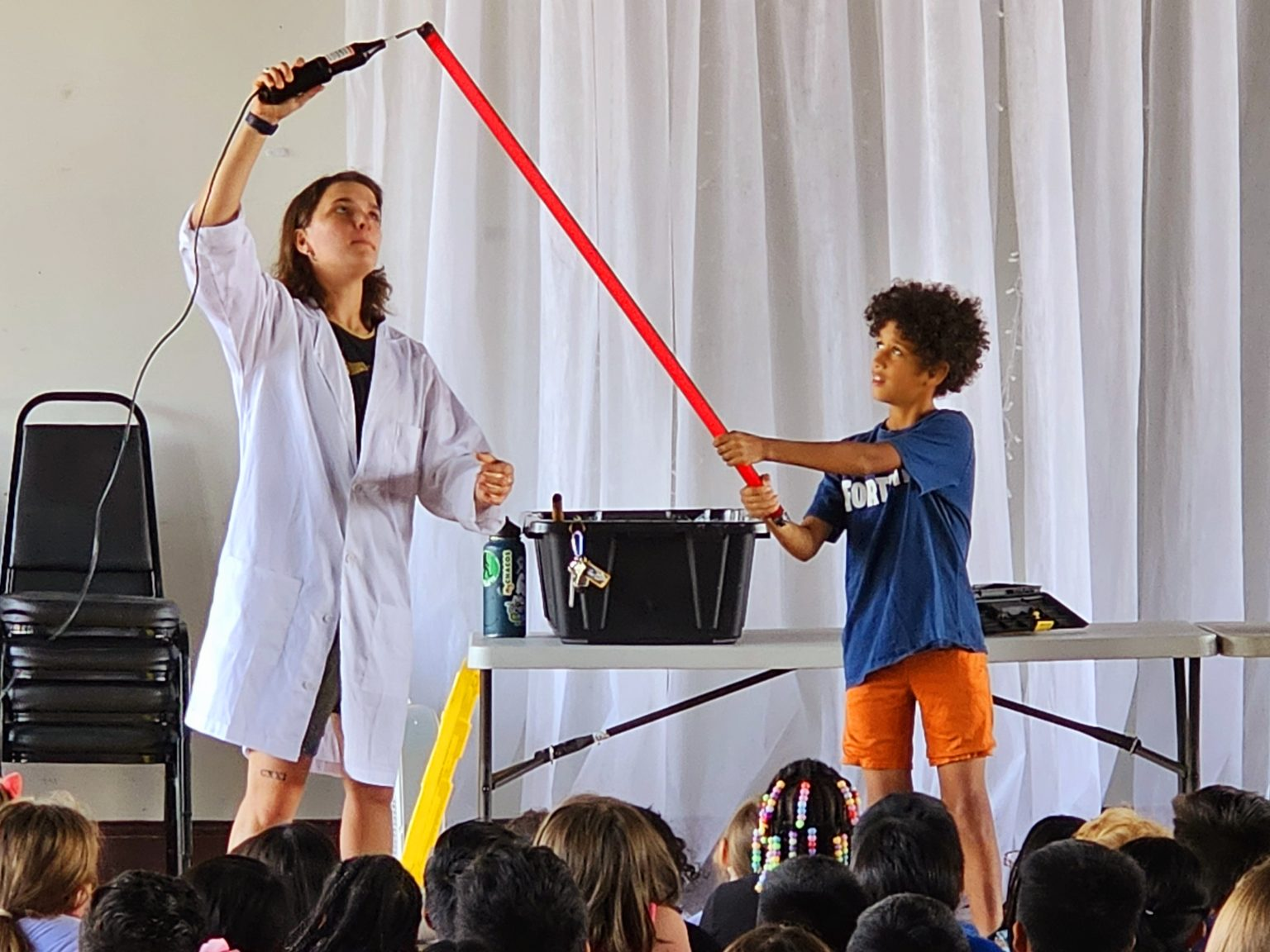 Picture of kids doing a demonstration