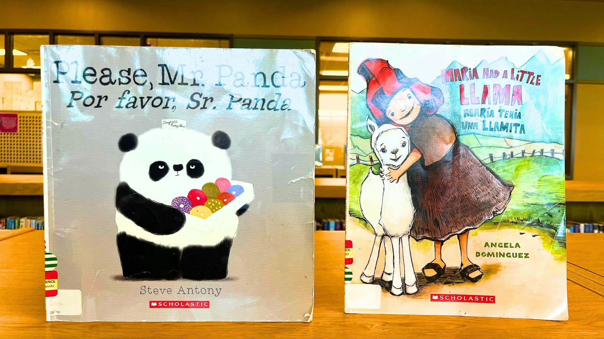 The image features two children's books: "Please Mr. Panda" by Steve Antony and "Maria Had a Little Llama" by Angela Dominguez.