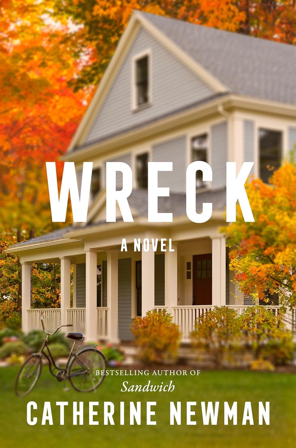Book cover featuring a house with autumn trees and a bicycle. Title: "Wreck" by Catherine Newman.