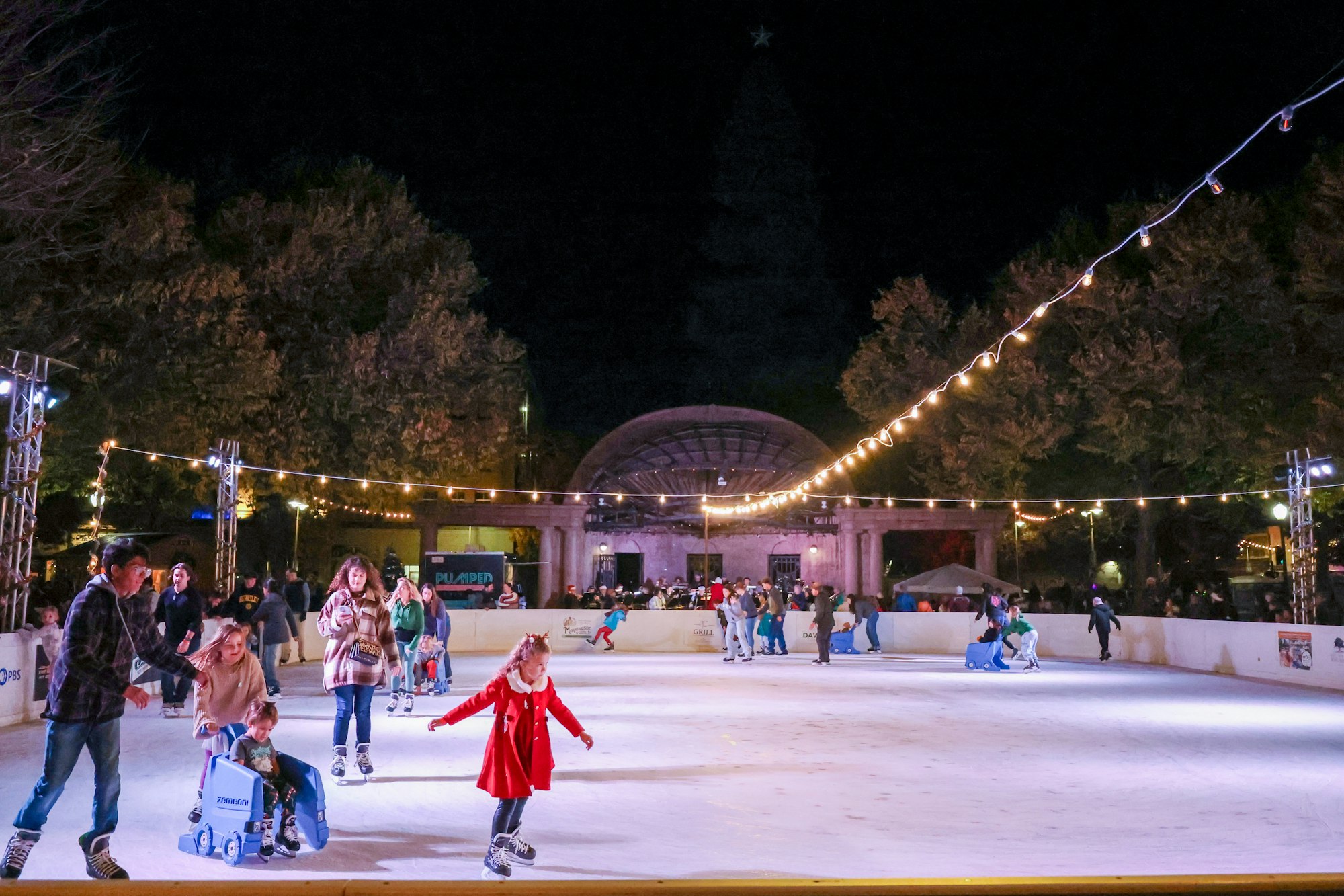 May contain: child, female, girl, person, clothing, footwear, shoe, ice skating, ice skating dancing, performer, rink, skating, sport, accessories, bag, and handbag