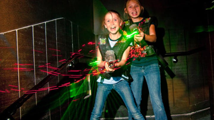 May contain: person, human, night life, light, and laser