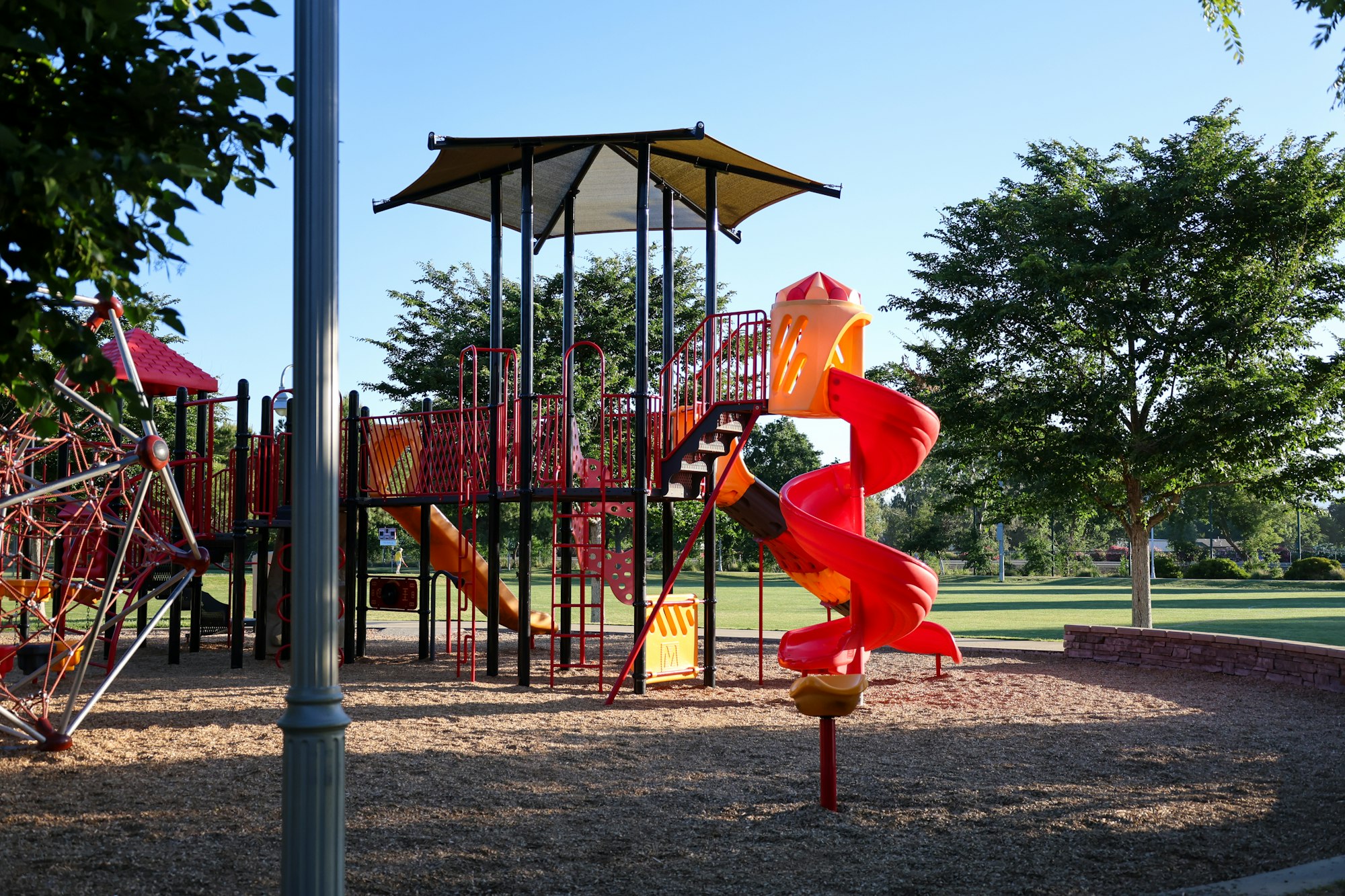May contain: outdoor play area, outdoors, play area, and person