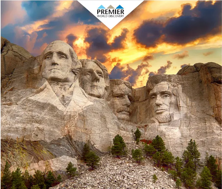 The image features Mount Rushmore, showcasing the carved faces of four US presidents against a colorful sky.