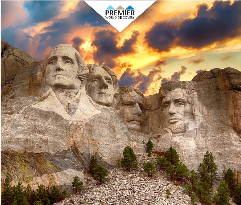 The image features Mount Rushmore, showcasing the carved faces of four US presidents against a colorful sky.