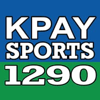 A logo with the text "KPAY SPORTS 1290" on a blue and green background.