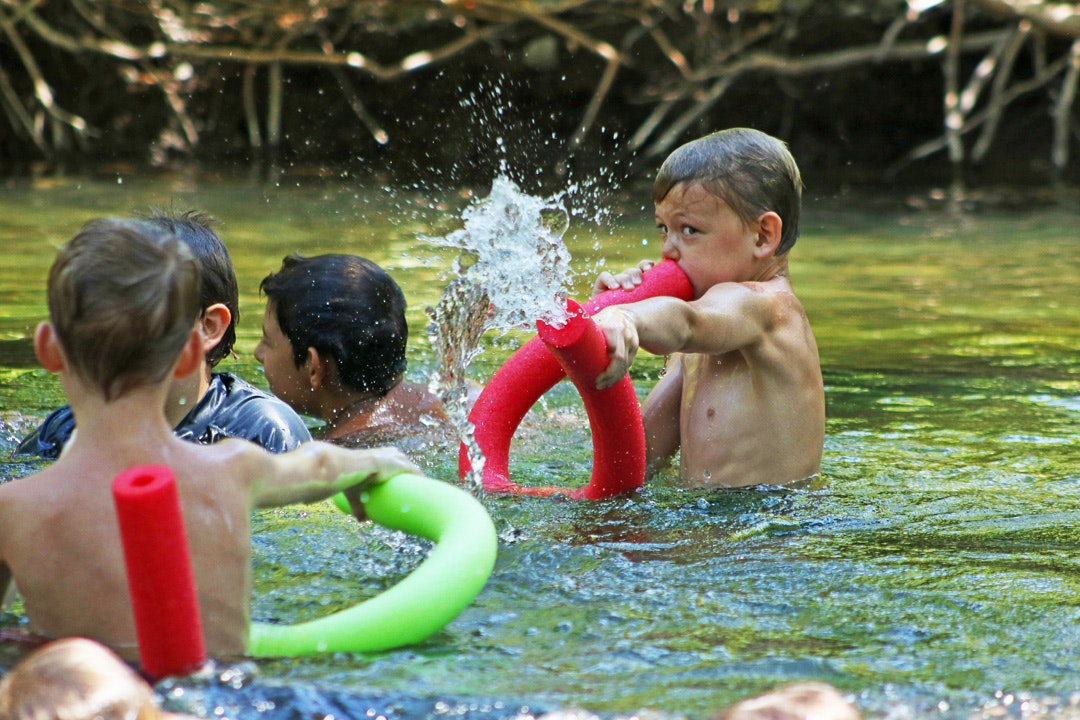 May contain: water, person, and human