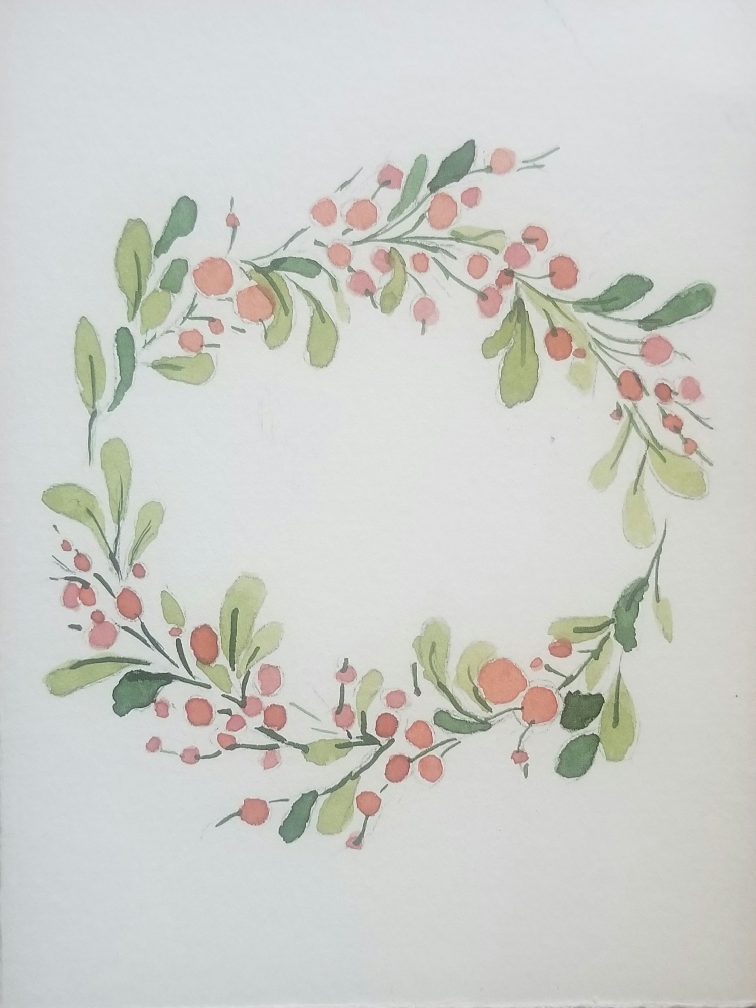 A watercolor wreath of green leaves and orange berries on a white background.
