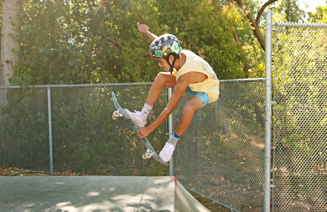 May contain: human, person, apparel, clothing, tennis racket, racket, sport, and sports