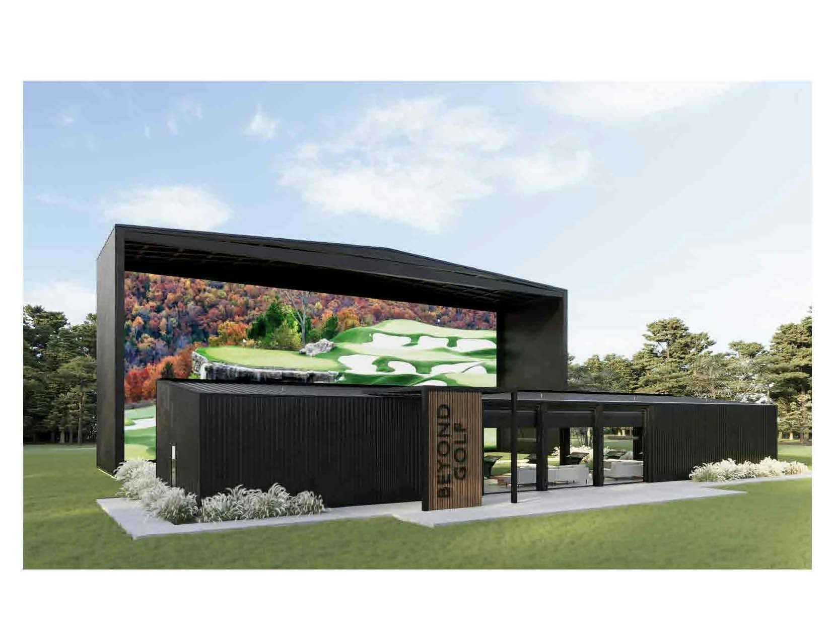 Modern building with large screen displaying a golf scene, surrounded by nature.