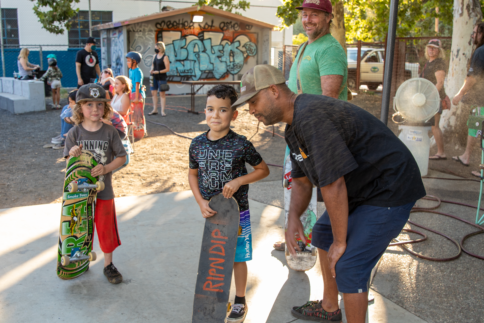 May contain: person, human, clothing, apparel, shoe, footwear, skateboard, sport, and sports
