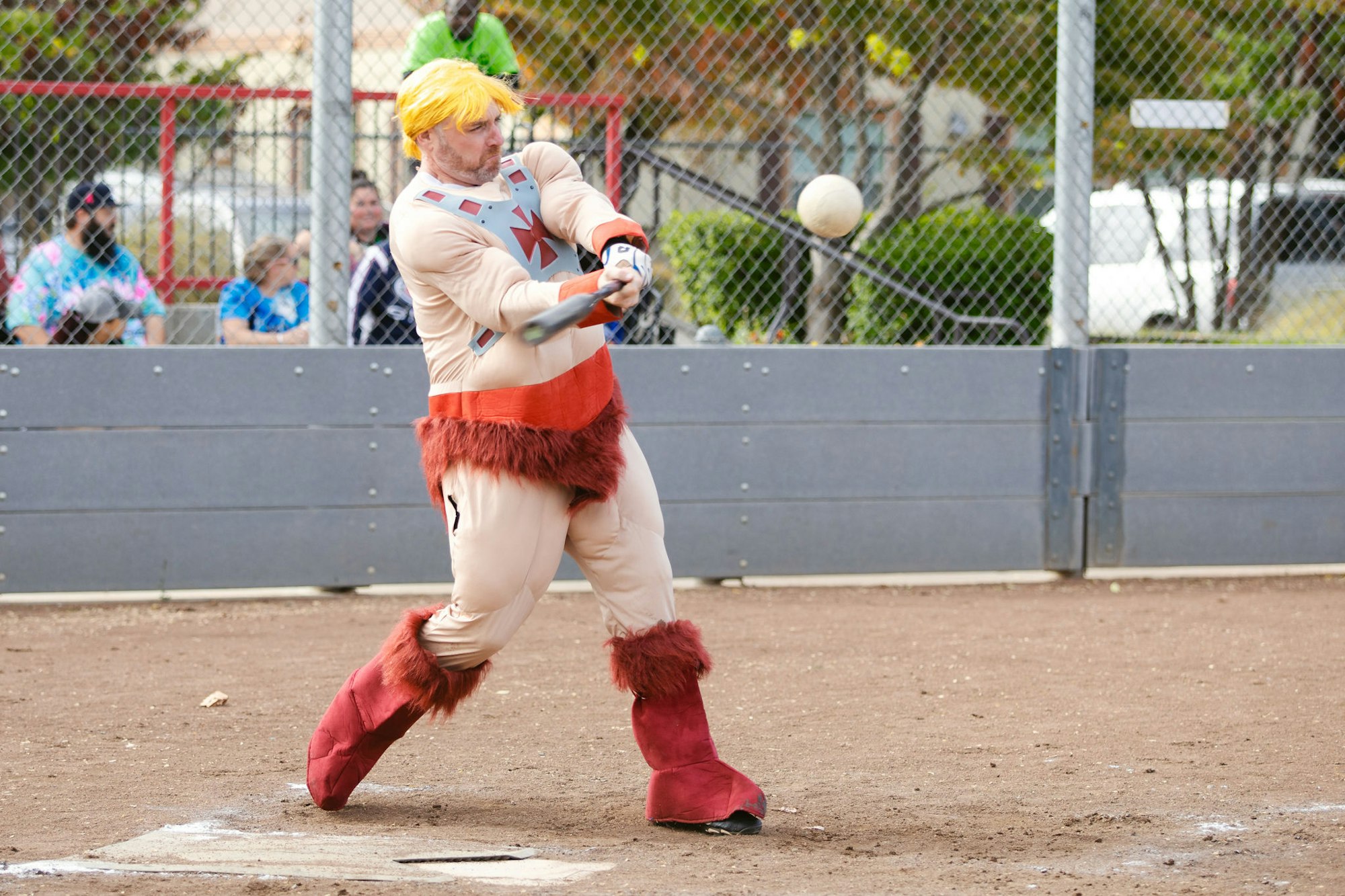 Person in a whimsical costume playing baseball.