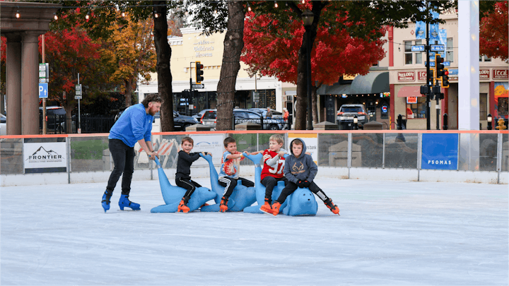 May contain: clothing, glove, person, adult, male, man, light, traffic light, ice skating, ice skating dancing, performer, rink, skating, sport, footwear, shoe, boy, child, car, transportation, and vehicle