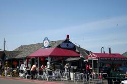 May contain: indoors, restaurant, diner, food, cafeteria, and person