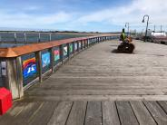 May contain: water, waterfront, boardwalk, bridge, architecture, building, deck, house, housing, porch, path, pier, and walkway