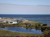 May contain: lagoon, lake, nature, outdoors, water, waterfront, sea, scenery, land, shoreline, grass, plant, sky, and coast