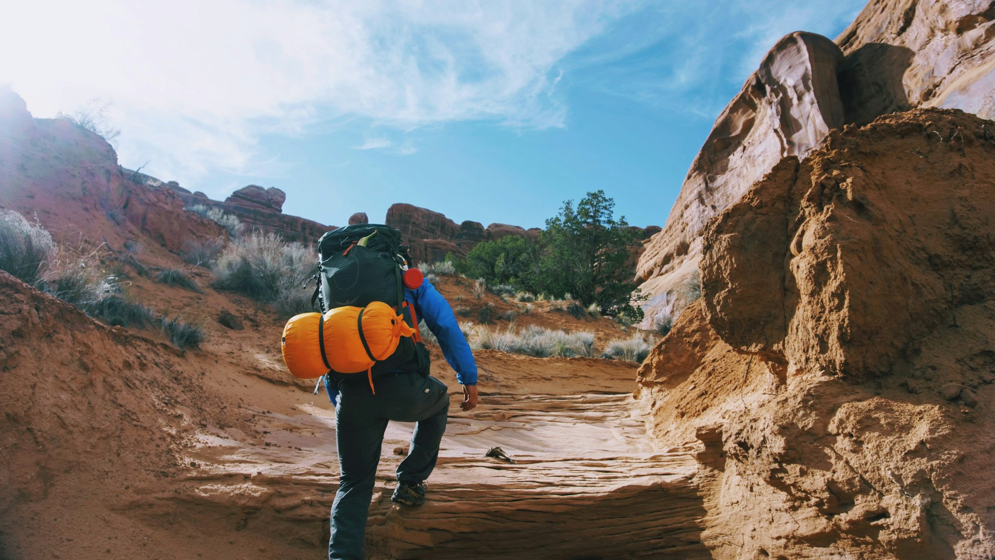 May contain: bag, backpack, backpacking, person, clothing, footwear, and shoe