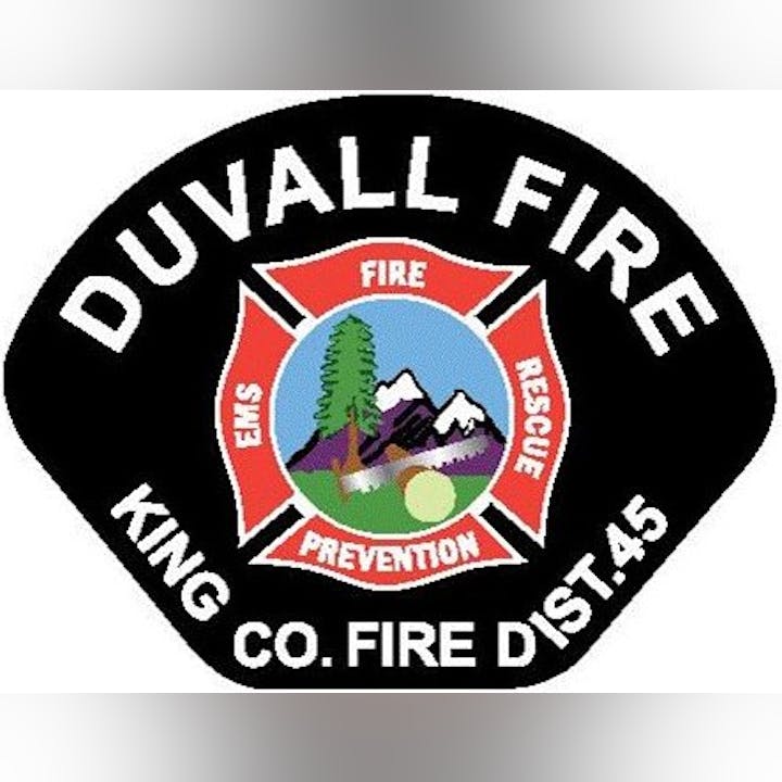 Patch for Duvall Fire, King County Fire Dist. 45, featuring mountains, a tree, and an axe with the words EMS, Fire, Rescue, Prevention.