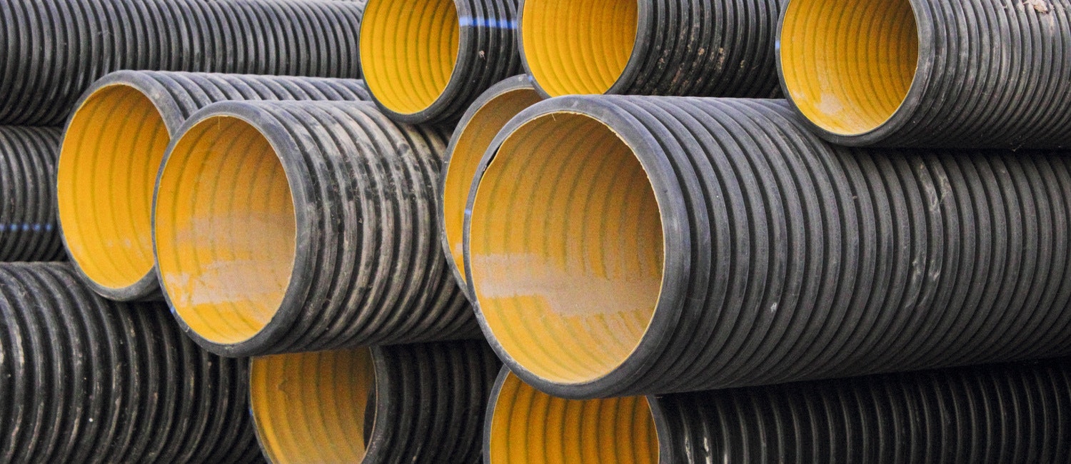 black and yellow wastewater tubes