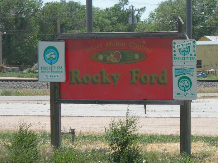 May contain: advertisement, outdoors, sign, and symbol
