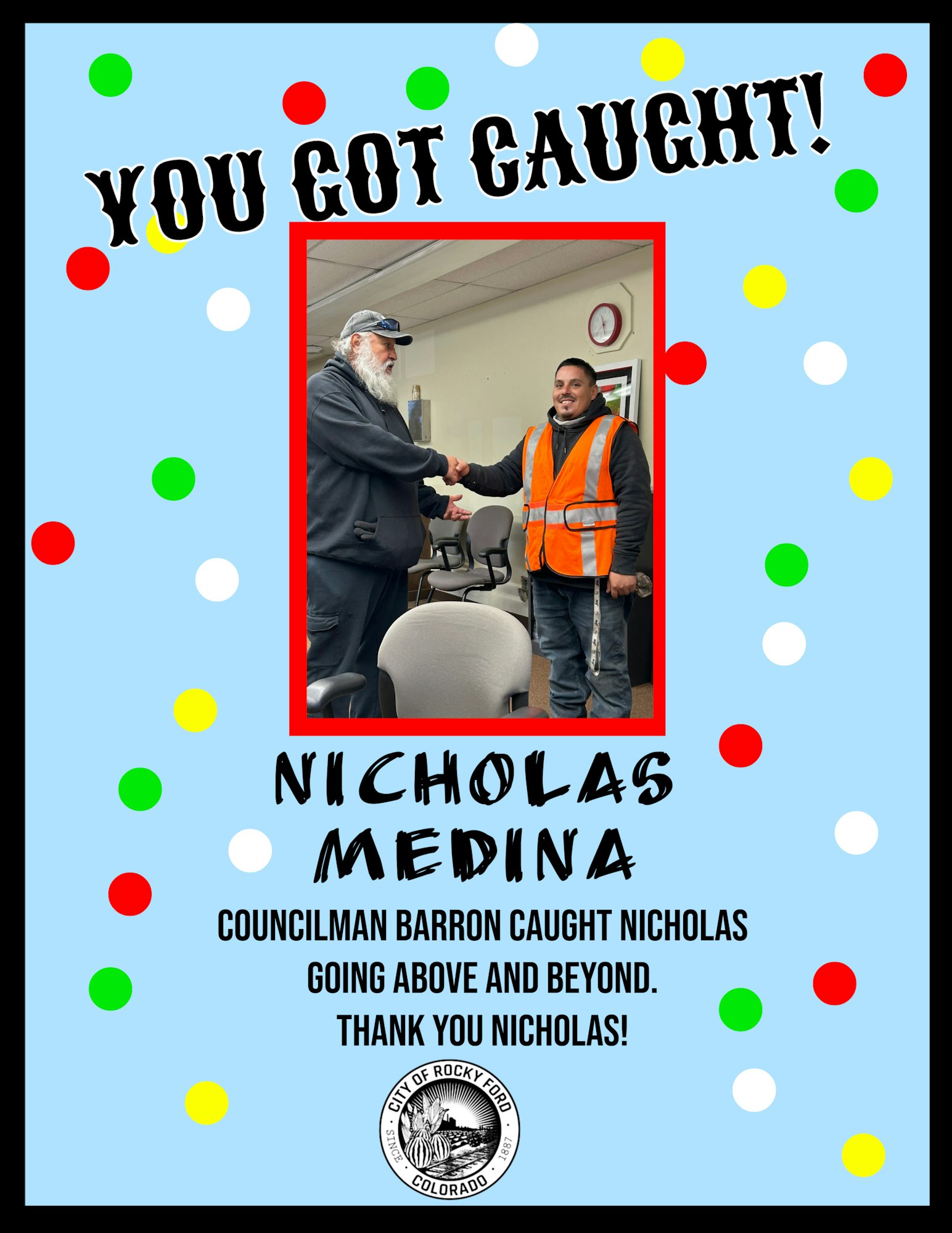 Two men shake hands; a congratulatory poster for Nicholas Medina's outstanding work, involving Councilman Barron, City of Rocky Ford.