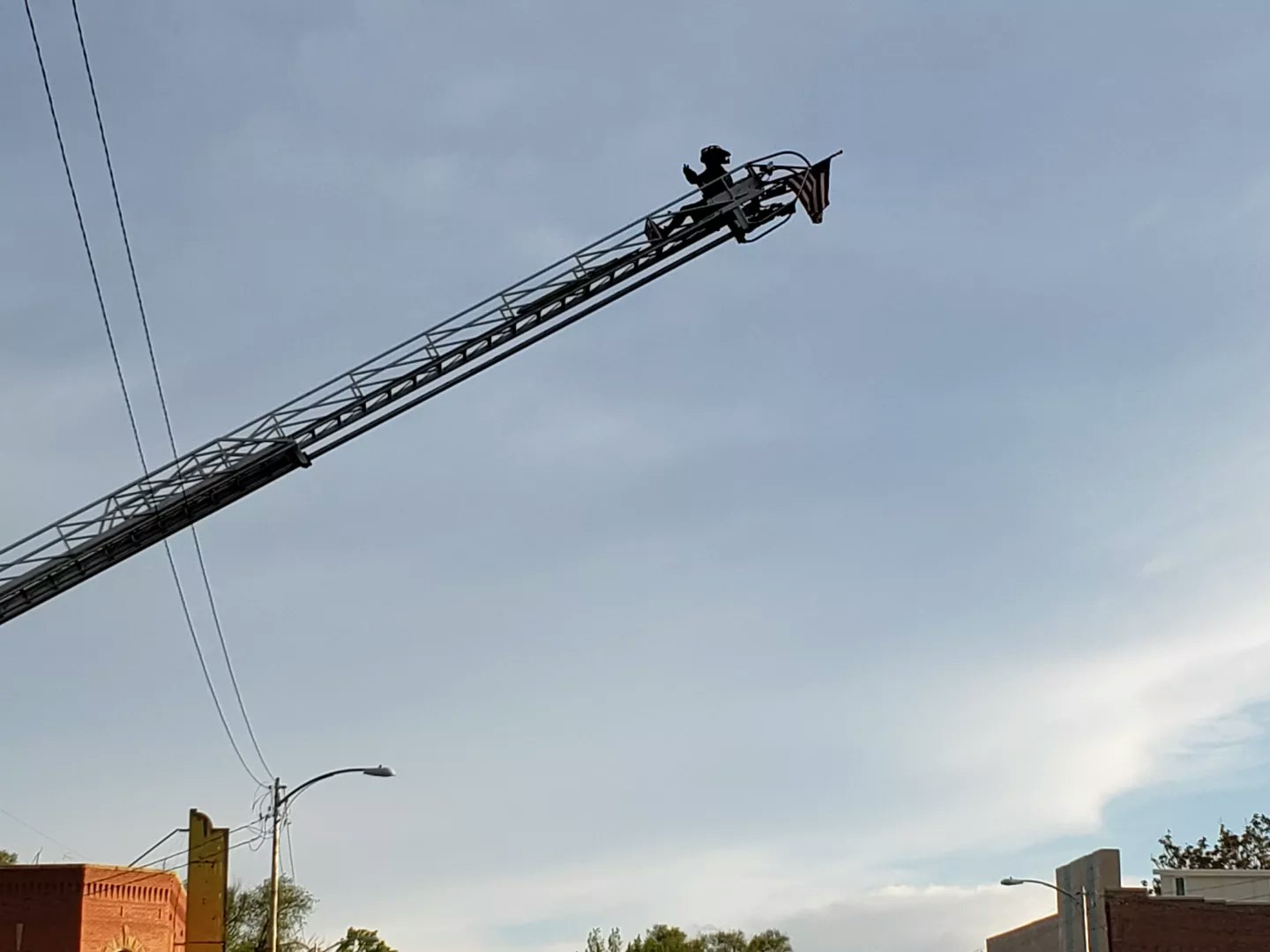 firefighter on ladder crane