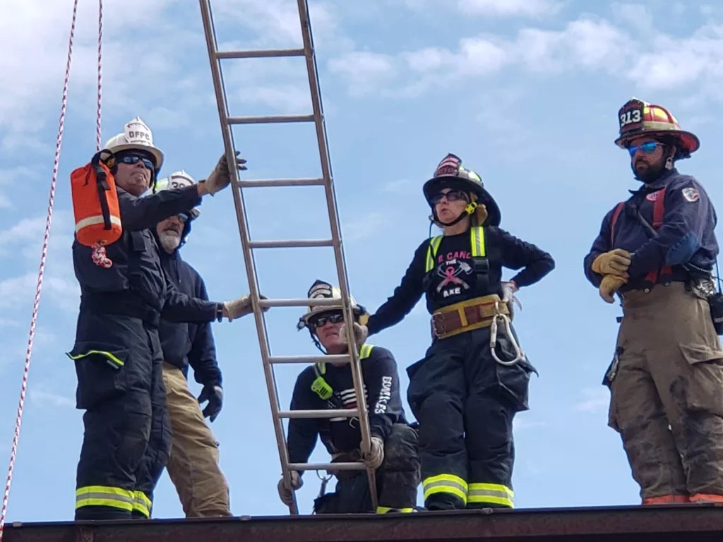 firefighters on roof