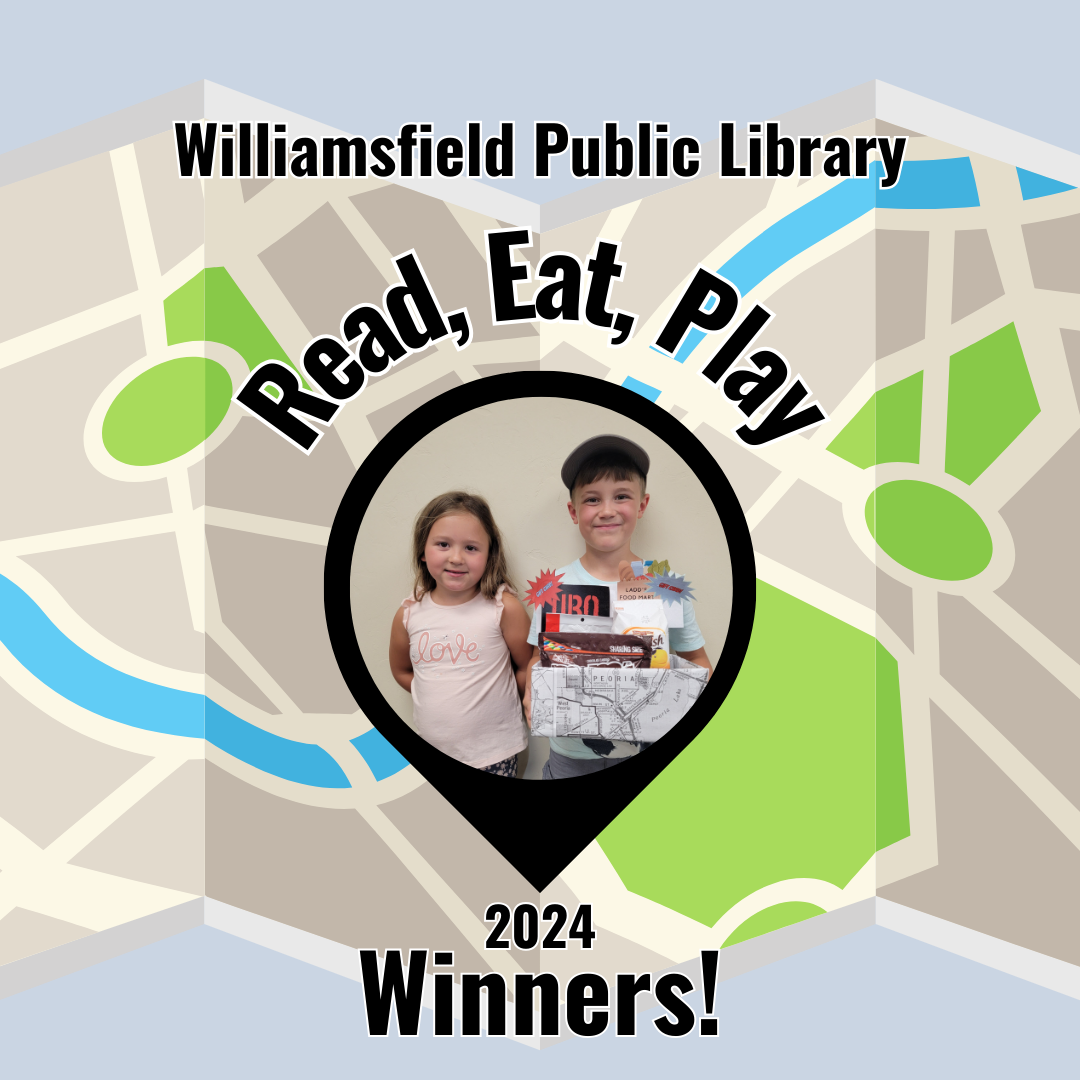Two kids with a prize against a library's "Read, Eat, Play" event backdrop; they're the 2024 winners.