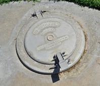 May contain: hole, manhole, drain, and sewer