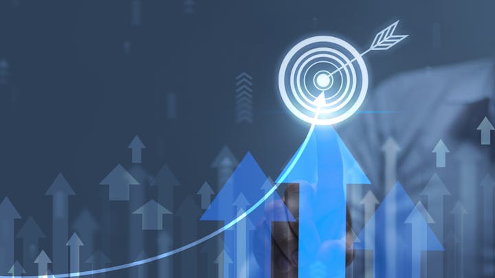 A digital arrow hits a target hologram, surrounded by upward arrows, symbolizing growth and success.