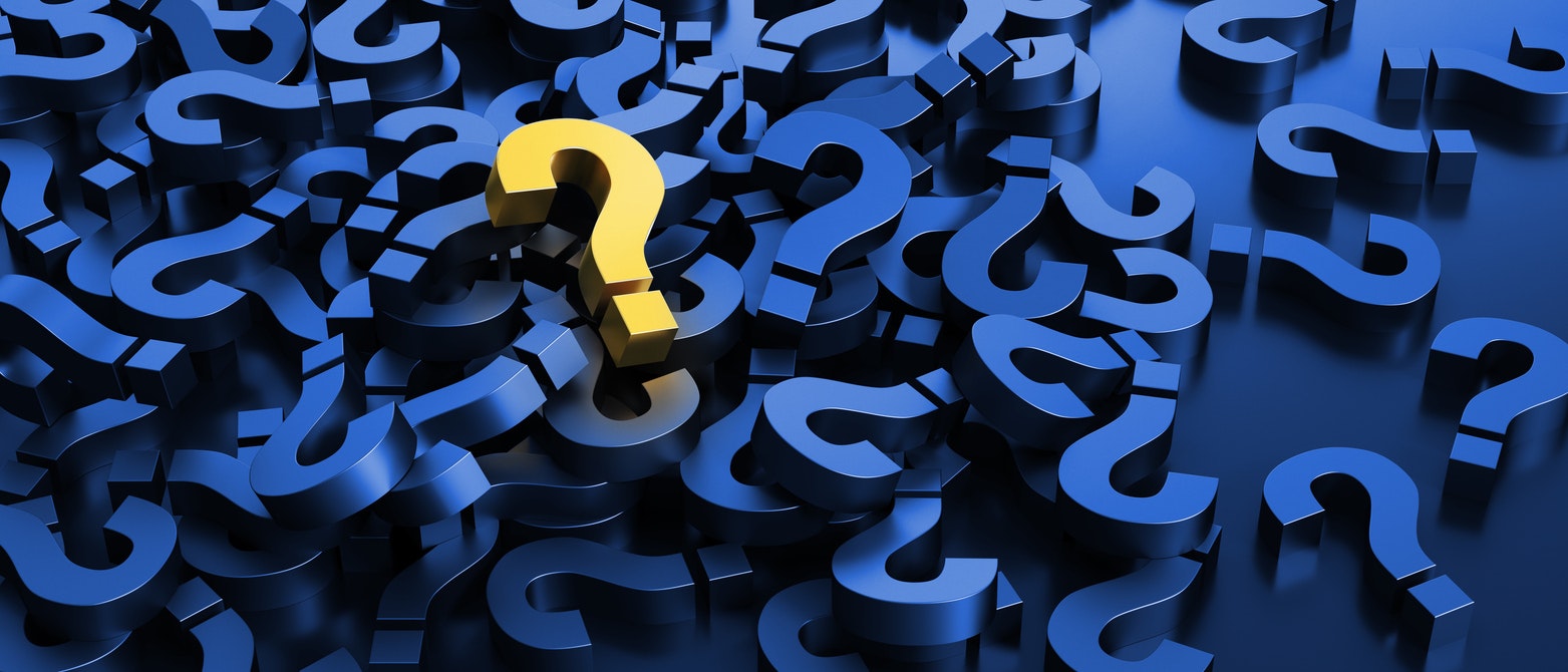 A cluster of blue question marks with a single yellow question mark in the center.
