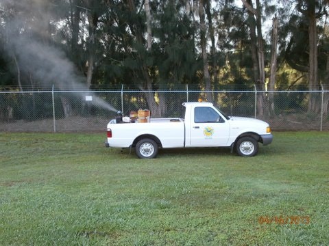 Truck spraying for mosquitoes