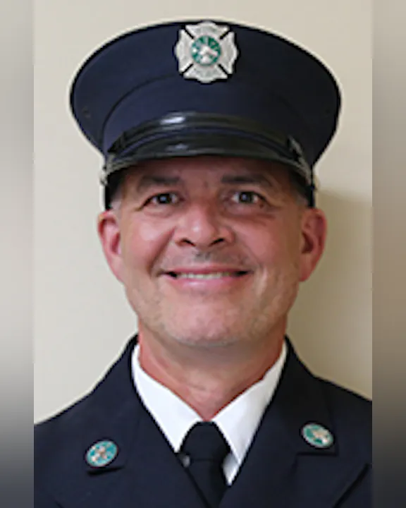 Scot Garland in his Class A uniform, including cap.