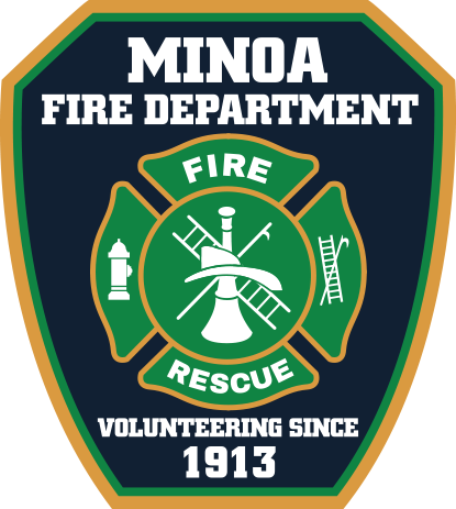 This image displays the badge of the Minoa Fire Department, featuring firefighting symbols and text, indicating service since 1913.