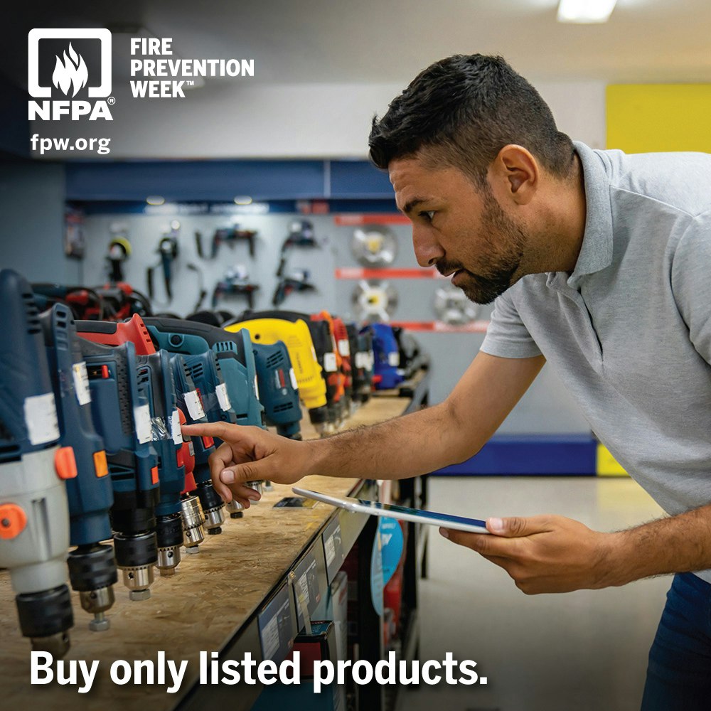 A man examines power tools in a store. Text reads, "Buy only listed products," with an NFPA Fire Prevention Week logo.