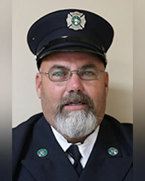 Tim Decker in his Class A uniform including cap.