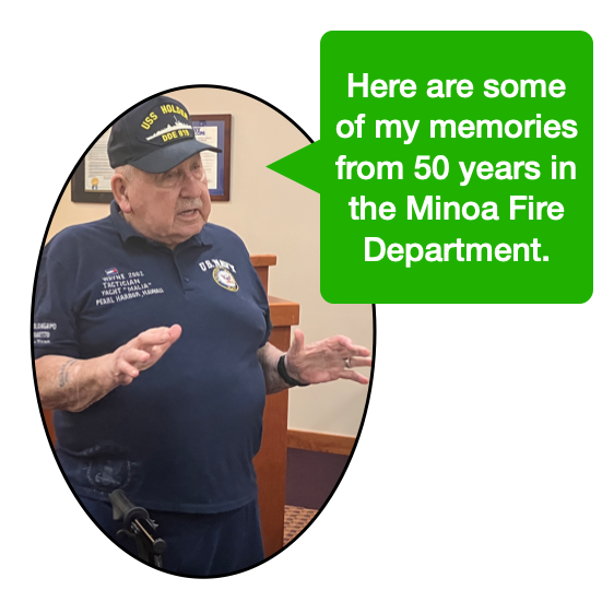 Wayne, wearing Navy references, speaks about his 50-year experience with the Minoa Fire Department.