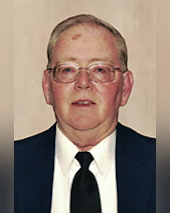Pat Meehan in 2013, wearing glasses, a dark suit, and a tie, with a neutral background.