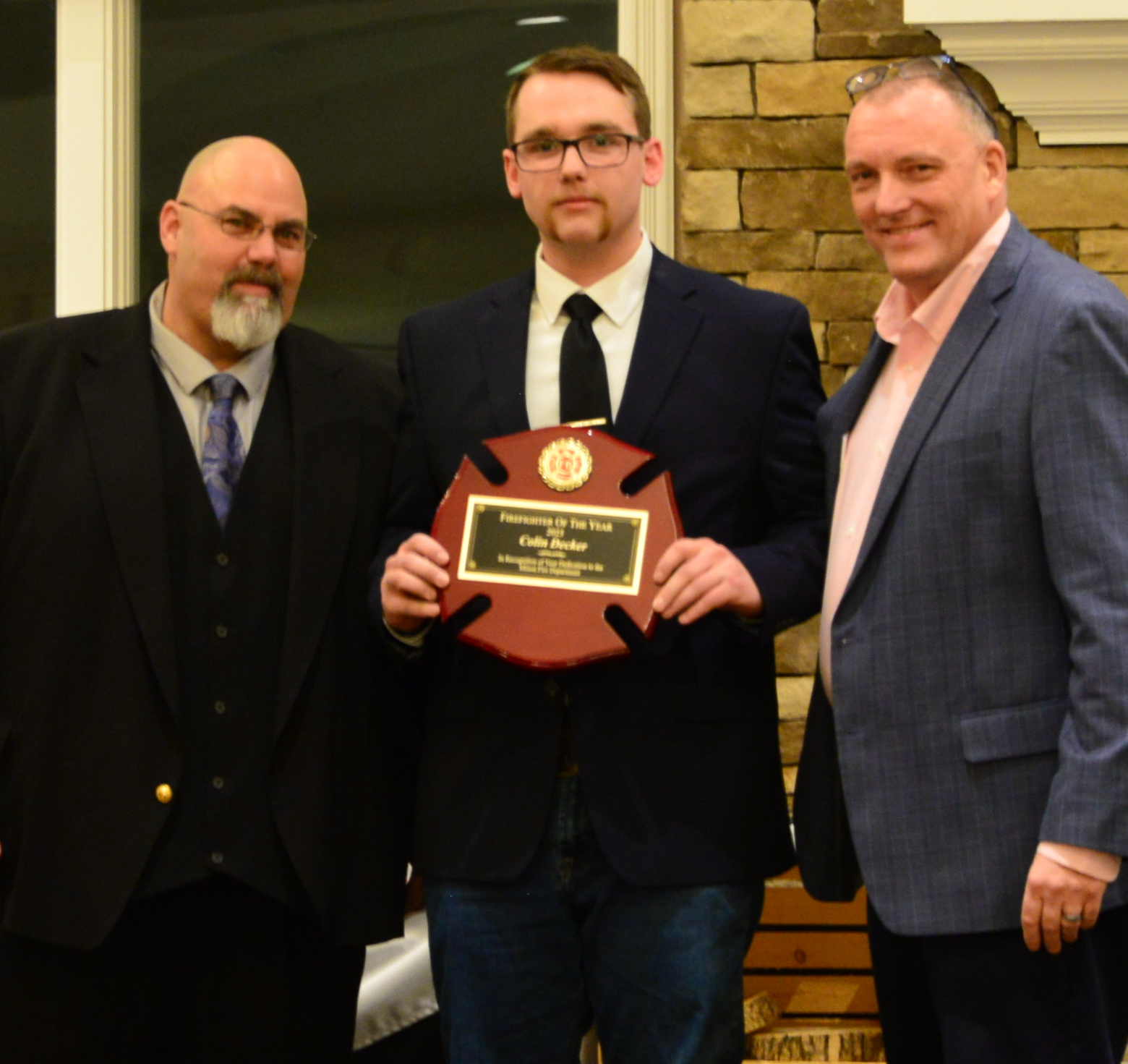 Colin Decker, Firefighter of the Year. Tim Decker (left) and Don Grevelding (right)