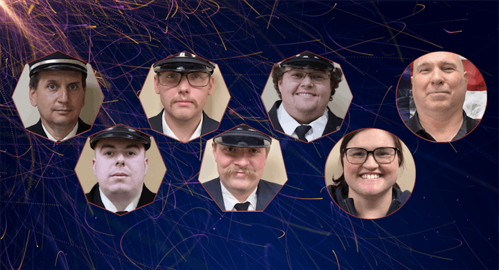 Seven people in uniform hats and a person without a hat on a sparkly abstract background.