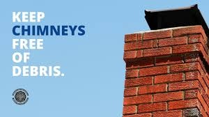 Chimney, red brick, with slogan - keep chimneys free of debris