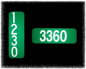 reflective green emergency address signs