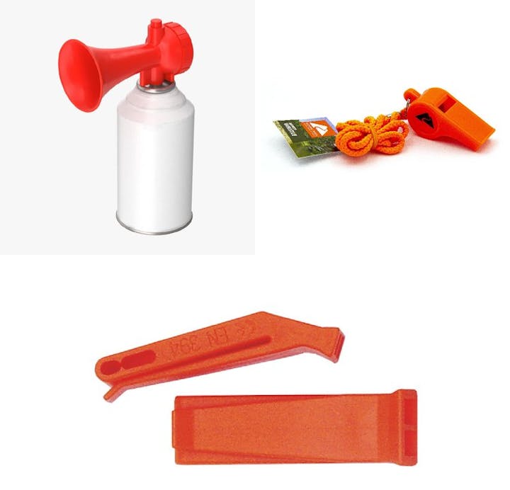 Air horn, whistle with lanyard, and two marine distress signal devices.