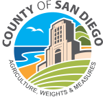 Seal of County of San Diego: features landscape, coast, and a building, with text "Agricultural Weights & Measures."