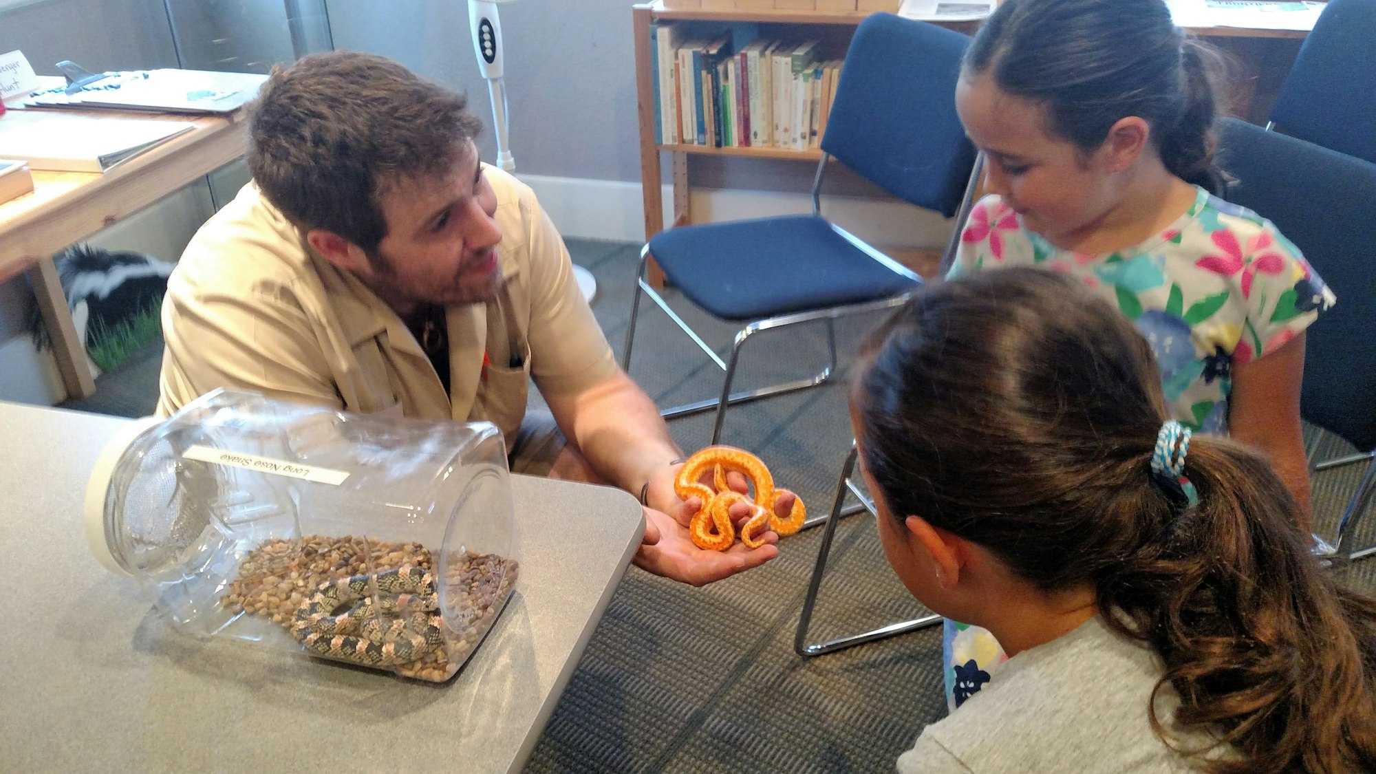 Guest speaker for Day of Wonder displaying native snake species